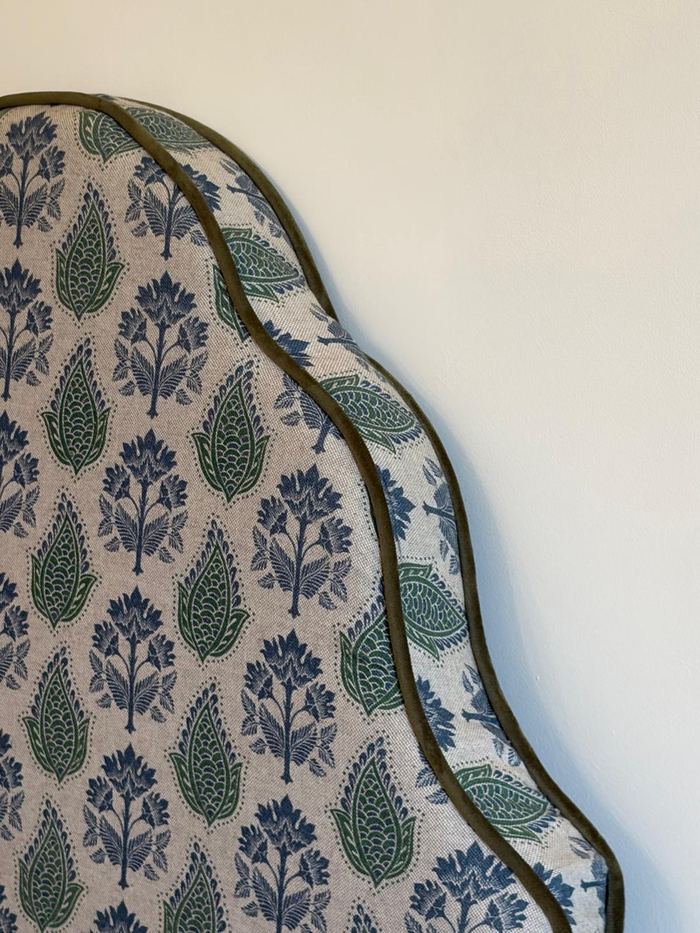 Close-up of a hand-finished patterned headboard