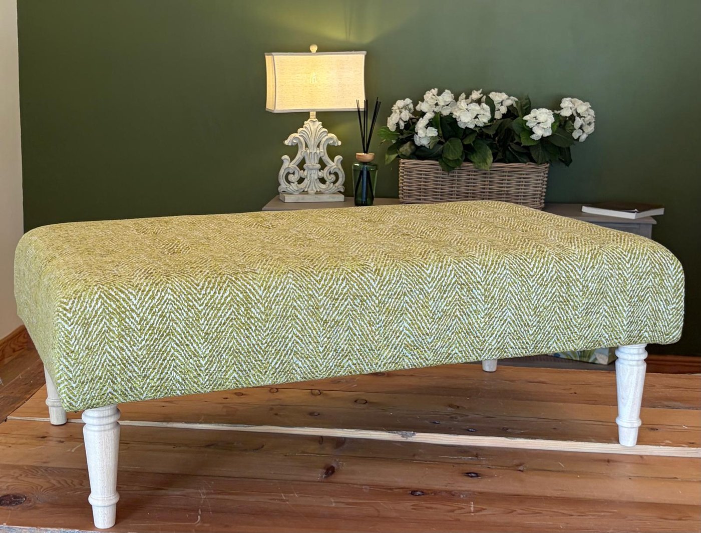 Herringbone green upholstered footstool with turned wooden legs